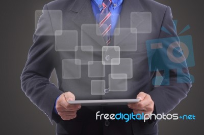 Businessman Use Touch Pad For Pay Something Stock Photo