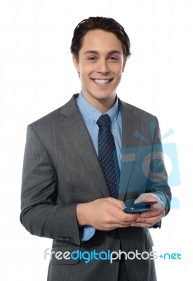 Businessman Using A Smartphone Stock Photo