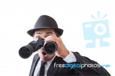 Businessman Using Binoculars Stock Photo