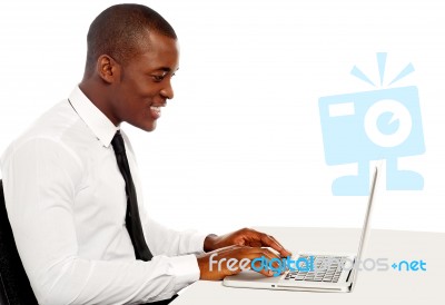 Businessman Using Laptop Stock Photo