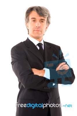 Businessman With Arms Crossed Stock Photo