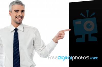 Businessman With Black Panel Stock Photo