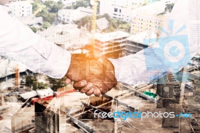 Businessman With Construction Projects Stock Photo