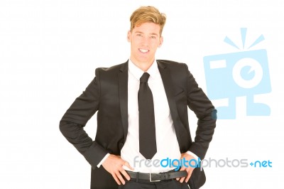 Businessman With Hands On Hips Stock Photo