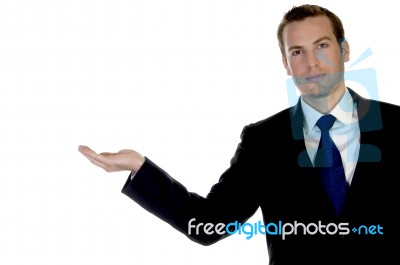 Businessman With Open Palm Stock Photo