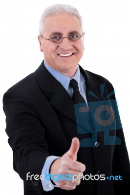 Businessman With Thumb Up Stock Photo