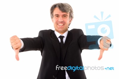 Businessman With Thumbs Down Stock Photo