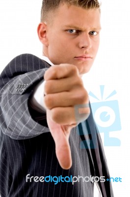 Businessman With Thumbs Down Stock Photo