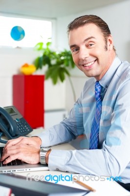 Businessman Working On His Laptop Stock Photo