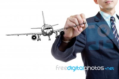 Businessman Writing Air Plane Stock Photo