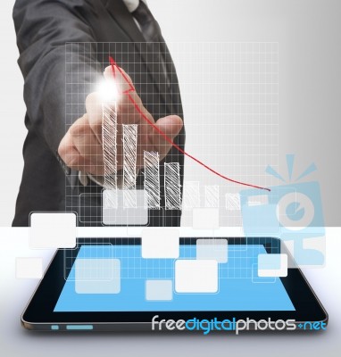 Businessmans Hand And Grow Graph Stock Photo