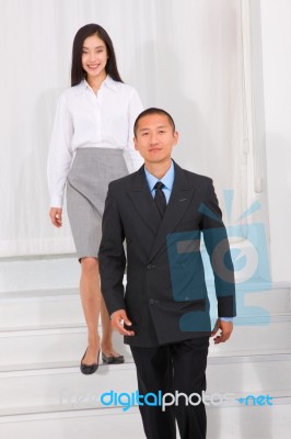 Businesspeople Walking Stairs Stock Photo
