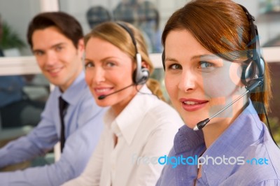Businesspeople With Head Phone Stock Photo
