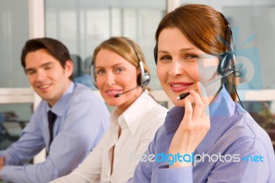 Businesspeople With Head Phone Stock Photo
