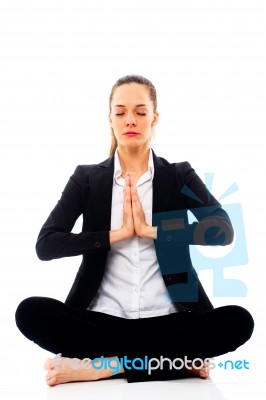 Businesswoman Doing Yoga Stock Photo