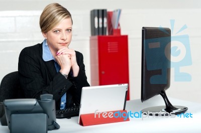 Businesswoman Hand Under Chin Stock Photo