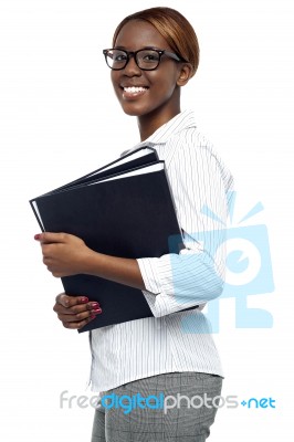 Businesswoman Holding Office Files Stock Photo