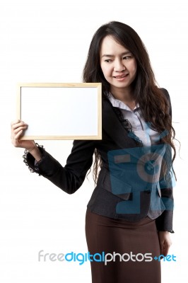Businesswoman Holding White Board Stock Photo