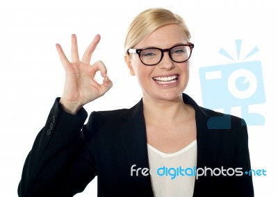 Businesswoman Posing With Ok Sign Stock Photo