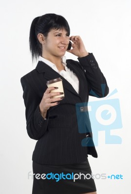 Businesswoman Talking On The Phone While Hav Stock Photo