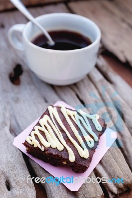 Cake Chocolate Brownie And Hot Coffee On Old Wooden Background Stock Photo