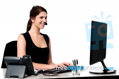 Call Centre Executive Working On Computer Stock Photo