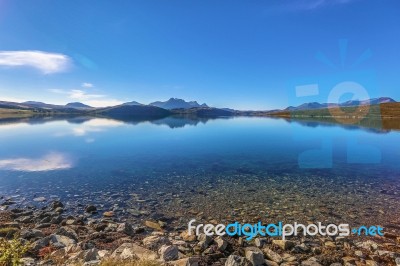 Calm Blue Loch Stock Photo