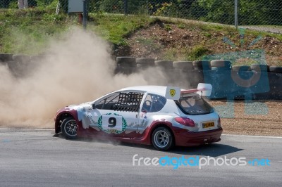 Car Spinning Off The Track At Brand's Hatch Kent Stock Photo