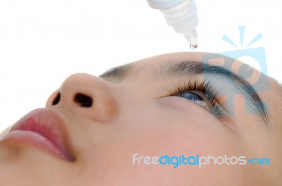 Caring For Eyes With Eye Drops Stock Photo