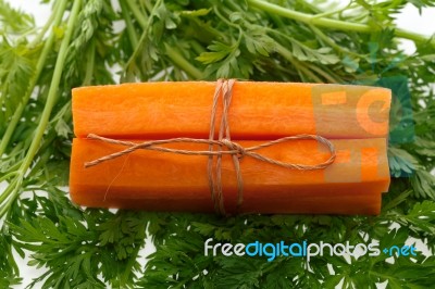 Carrot On  Leaves Stock Photo
