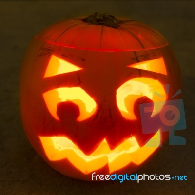 Carved Lit Halloween Pumpkin Stock Photo