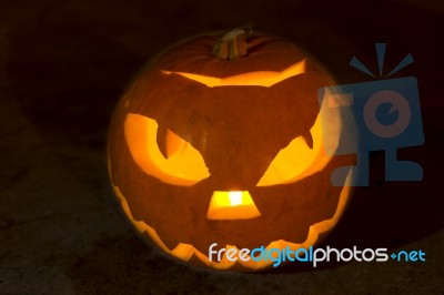 Carved Lit Halloween Pumpkin Stock Photo