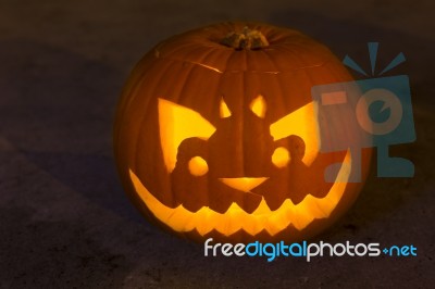 Carved Lit Halloween Pumpkin Stock Photo