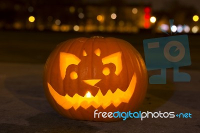 Carved Lit Halloween Pumpkin Stock Photo