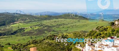 Casares, Andalucia/spain - May 5 : View Of Windmills And Casares… Stock Photo