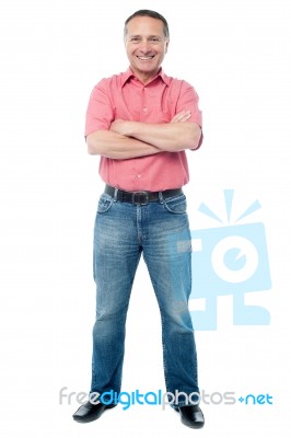 Casual Aged Man Standing On White Background Stock Photo