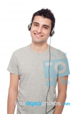 Casual Man Listening Music Stock Photo