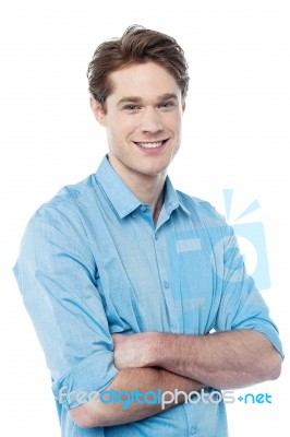 Casual Man With Arms Crossed Stock Photo