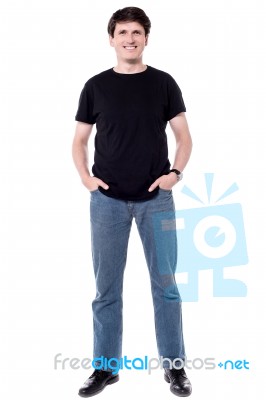 Casual Man With Hands In Pockets Stock Photo