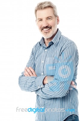 Casual Pose Of A Senior Man Stock Photo