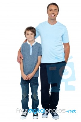 Casual Studio Shot Of Father And Son Stock Photo