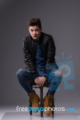 Casual Young Man In Black Leather Jacket And Denim Jeans Stock Photo Casual Young Man In Black Leather Jacket And Denim Jeans Stock Photo