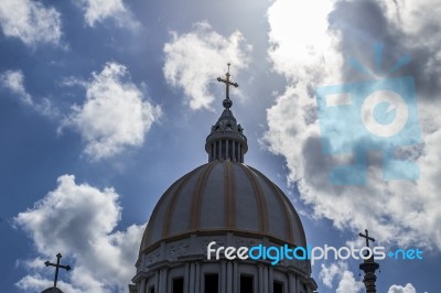 Catholic Church With Clouds In The Background Stock Photo