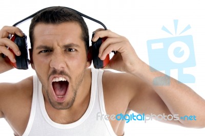 Caucasian Guy Enjoying Rock Music With Full Volume Stock Photo