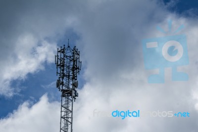 Cellphone Tower With Clouds In The Background Stock Photo
