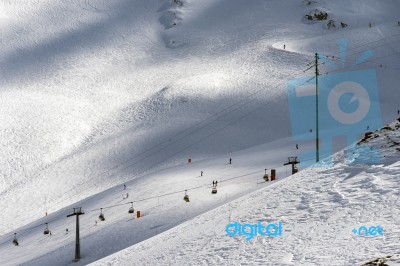 Chair Lift In The Dolomites At The Pordoi Pass Stock Photo