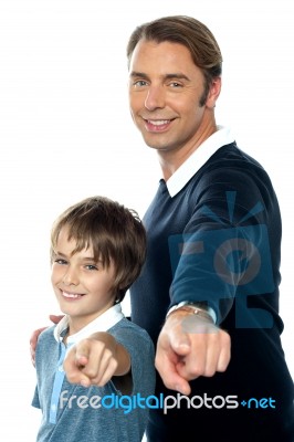 Charming Father And Son Pointing At You Stock Photo