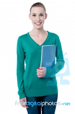 Charming Student Holding Spiral Notebook Stock Photo Charming Student Holding Spiral Notebook Stock Photo