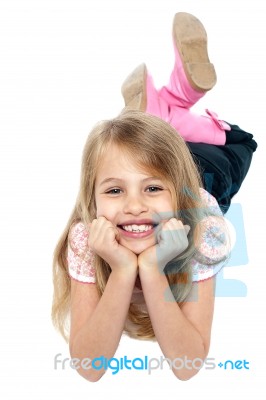 Cheeky Young Girl Posing For A Portrait Stock Photo
