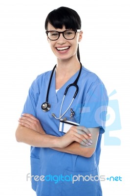 Cheerful Doctor With Stethoscope Around Her Neck Stock Photo